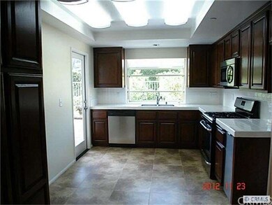 Kitchen with cherrywood cabinets