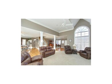 ...wall of arched windows and a high ceiling with 