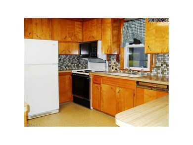 A view of the entire kitchen as seen from the fami
