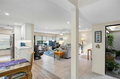 Living room featuring light tile patterned floors,