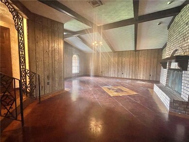 Living with vaulted ceiling, wood burning fireplac