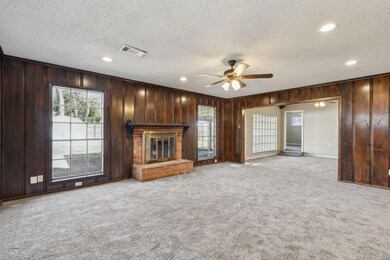 Unfurnished living room with carpet, a healthy amo