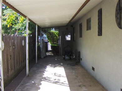 left side of house covered patio area