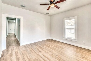 Unfurnished room featuring ceiling fan and light h