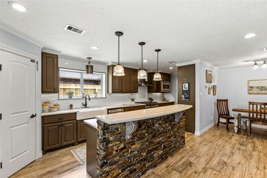 Open kitchen with breakfast bar for extra seating. If brown isn't your cabinet color choice, let our seller help you get them just the color you want! Just ask me how!