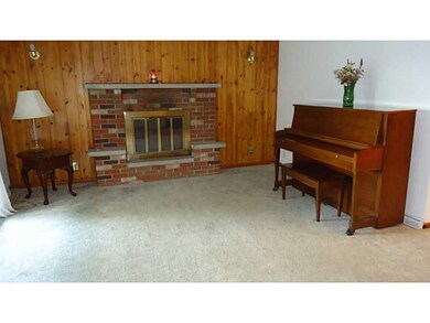 Family Room. family room with log burning fireplac