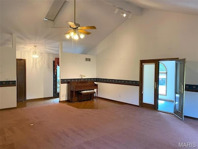 Living room open to sunroom