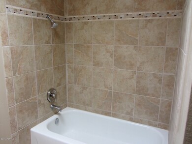 Updated custom tile bathrooms