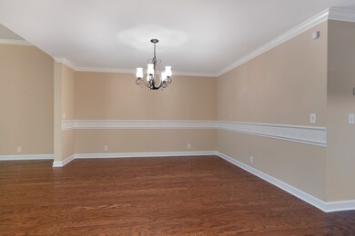 Dining room has custom chair rail