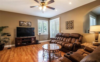 Family room sliding doors lead to the screened in
