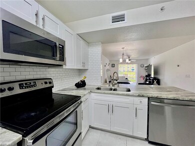 Kitchen with stainless steel appliances, tasteful 