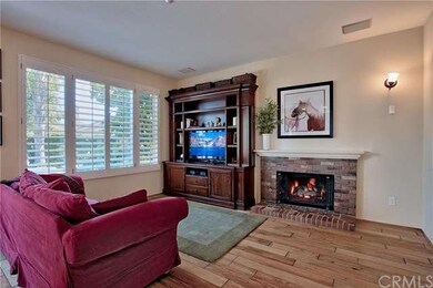 Inviting fireplace. Wired for surround sound.