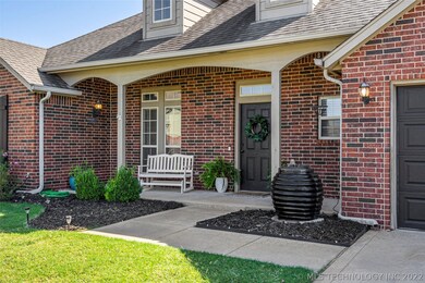 Covered front porch and entry offers an inviting l
