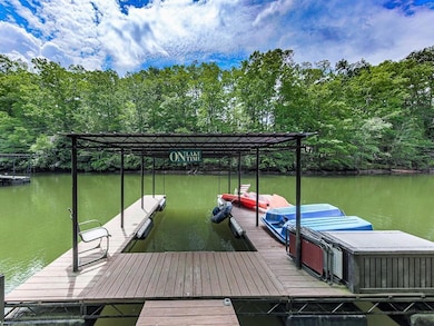 Dock featuring a water view
