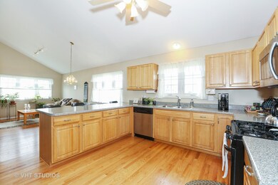 Full Kitchen with plenty of Cabinets.