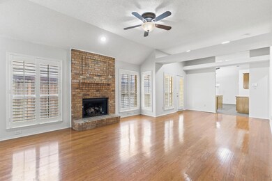 Unfurnished living room with a textured ceiling, a
