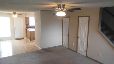 The living room looking toward the dining area.