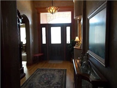 This exceptional foyer welcomes you