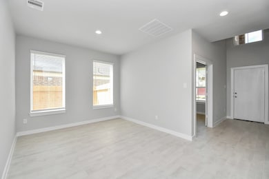 Craft enduring memories with loved ones around the table in this roomy dining area. It boasts stylish flooring, personalized paint, and is conveniently situated next to the family room and kitchen, fostering an open and inclusive ambiance. Sample photo of completed home with similar floor plan. Actual colors and selections may vary.
