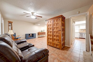 Living room, tiled throughout the downstais.