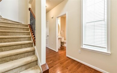 Entry hall and staircase to bedrooms and loft area