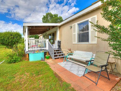 View of patio featuring a wooden deck