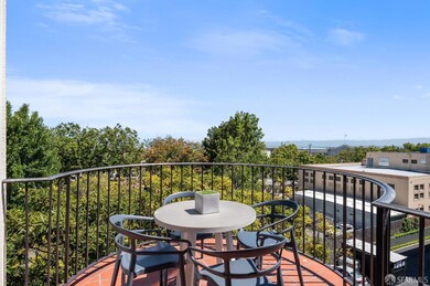 The living room’s lovely curved terrace faces nort