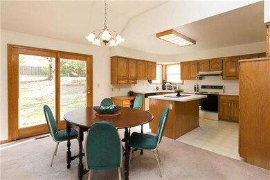 Kitchen/Dining combo with plenty of cabinet and co