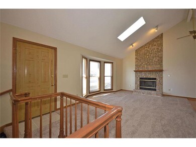 Light & Bright living room with skylight & bay win