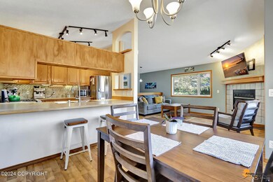 Dining w/breakfast bar open to kitchen