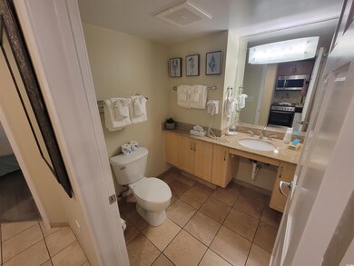 Bathroom featuring a sink and tile patterned floors