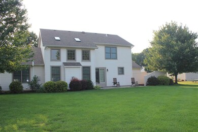 Large backyard with patio and hot tub with privacy