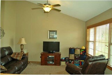 Enter the home into your spacious living room. The