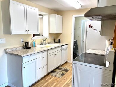 Kitchen with pass through to Florida room