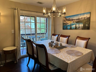 Spacious dining area with chandelier