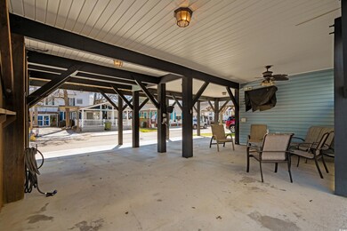 View of patio with a residential view and ceiling 