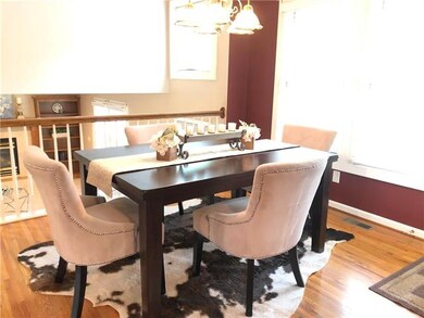 Breakfast room looking into the lower level living room