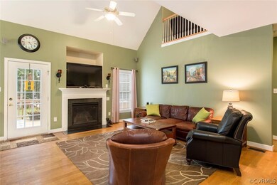 Family Room w/Vaulted Ceiling, Gas Log Fireplace &