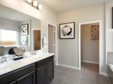 Photo is not of the actual home, but is an inspirational photo of builder’s model home and may depict options, furnishings, and/or decorator features that are not included