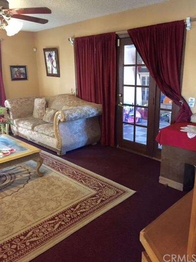 Living Room with French doors leading to the cover