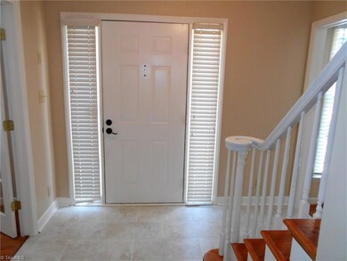 Front entry with new flooring and fresh paint