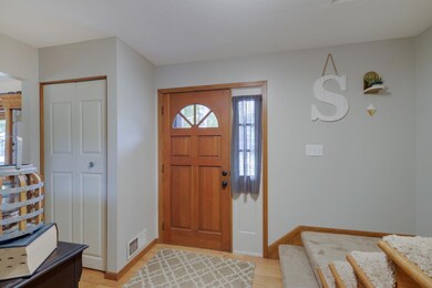 Entry has hardwood flooring and entry closet