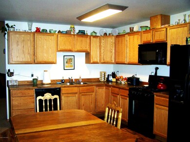 Kitchen with oak cabinets