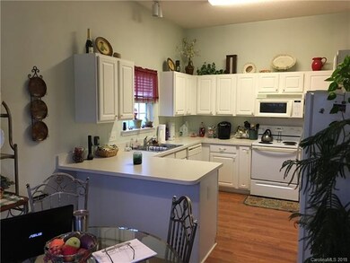 Nice bright Kitchen open to Breakfast area which o