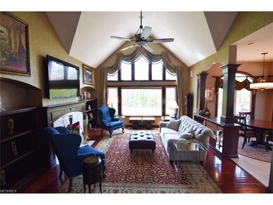 Wall of windows in Great Room overlooks the fairwa
