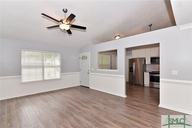 LIVING ROOM INTO KITCHEN