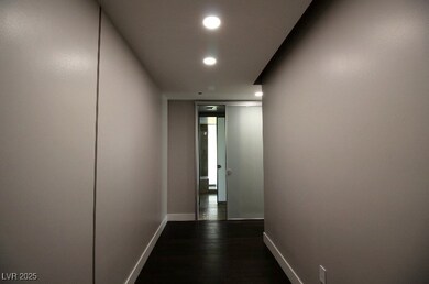 Hall featuring recessed lighting and dark wood-typ
