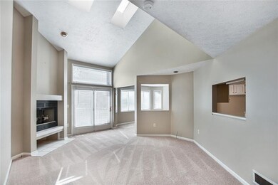 The family room also features a fireplace and acce