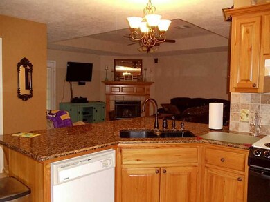 Kitchen. Kitchen open to the living room