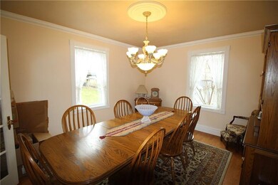 The dining room holds a table large enough for the